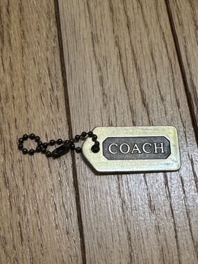 Coach Gold Metal Hang Tag and Patchwork Rehab Purse